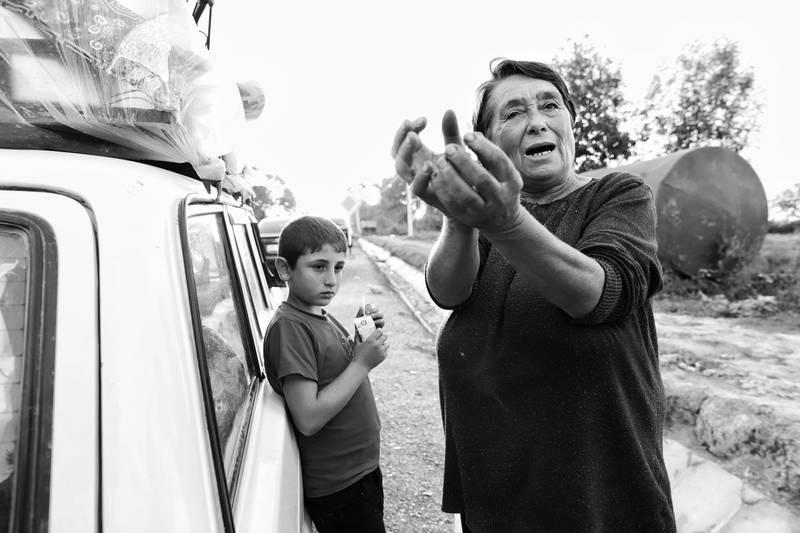 Elmira, 63 and her grandson, who had to flee their home in Artsakh’s Martuni region due to azerbaijani aggression. Syunik, Armenia. 2023