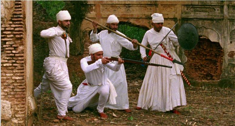 Nainsukh creating live tableaus for his paintings. Screengrabs from Nainsukh (2010). Image sourced from Vimeo, Google Arts & Culture